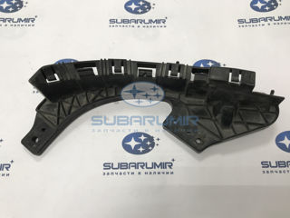 Фото автомобильной запчасти Кронштейн под фару левый S12 (оригинальный номер 57707SC030BU)