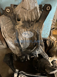 Фото автомобильной запчасти Балка задняя B14.  БУ. (оригинальный номер 20152AJ002)