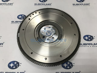 Фото автомобильной запчасти Маховик S11, S12  EJ255 (оригинальный номер 12342AA090)