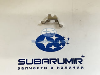 Фото автомобильной запчасти Зажим крышки омывателя фар В13 R (оригинальный номер 86644AG000)