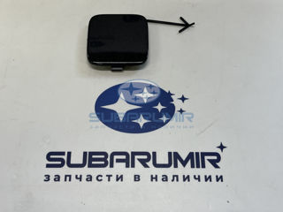 Фото автомобильной запчасти Заглушка буксировочного крюка задн бампера S13 (оригинальный номер 57731SG010EN)